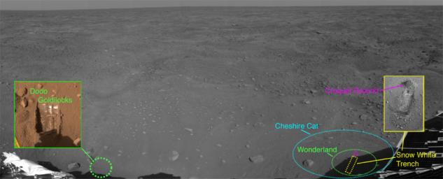 This image from NASA's Phoenix Mars Lander shows the spacecraft's activity site on June 16, 2008, after the spacecraft touched down on the Red Planet's northern polar plains. Parts of Phoenix can be seen in the foreground.