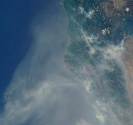 Lightning strikes have sparked more than a thousand fires in northern California. Cape Mendocino is at the center of the image and Mt. Shasta is near the upper right.