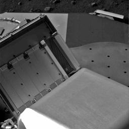 Double doors on the right are wide open in this image of four pairs of oven doors on NASA's Phoenix Mars Lander's Thermal and Evolved-Gas Analyzer (TEGA).