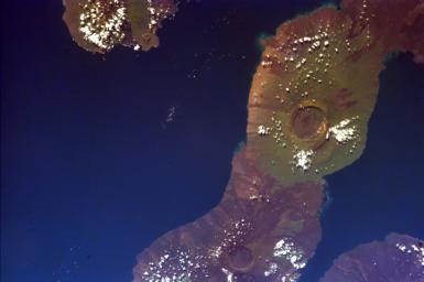 This image of the Galapagos Islands captures two large shield volcanoes on Isla Isabella, the largest and least inhabited island in the Galapagos chain. This image is from NASA's EarthKAM.