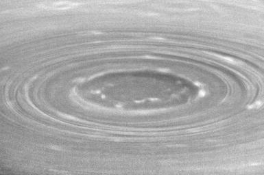 Shadows reveal the topography of Saturn's south polar vortex. At high resolution, a new, inner ring of isolated, bright clouds is seen. This image was taken with NASA's Cassini spacecraft's narrow-angle camera on July 15, 2008.