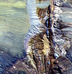 This image acquired by NASA's Terra satellite of northern Chile was acquired by ASTER on April 7, 2000. Dramatically displayed is a geological angular unconformity: a contact between layers of rock at different angles. 