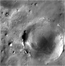 Victoria Crater is the most prominent circle near the upper left corner of this image from NASA's Mar Odyssey spacecraft.