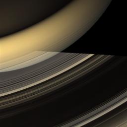 Rays of light from the sun have taken many different paths to compose this glorious image of Saturn and its rings taken by NASA's Cassini spacecraft on March 20, 2009.