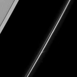 In the lower center of this image captures an intriguing feature of Saturn's tenuous F ring taken by NASA's Cassini spacecraft on March 23, 2009.