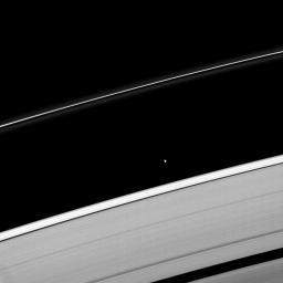 Saturn's moon Atlas plies the Roche Division between the A ring and the thin F ring. This image is from NASA's Cassini spacecraft.