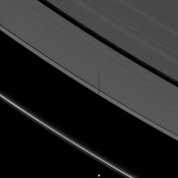 The moon Pandora casts a shadow onto Saturn's A ring but not the F ring. This image is from NASA's Cassini spacecraft.
