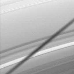 NASA's Cassini spacecraft snags a close-up view of the shadow cast onto Saturn's A ring by the moon Epimetheus as the planet approached its August 2009 equinox.