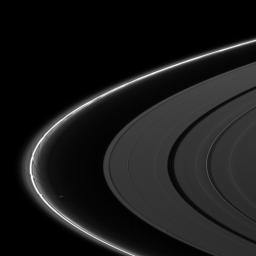 A scalloped look is created in the edges of the Keeler Gap in Saturn's outer A ring as the moon Daphnis orbits in the gap in this image from NASA's Cassini spacecraft taken on Feb. 25, 2009.