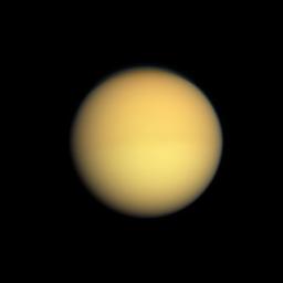 Seasonal changes in the atmosphere of Saturn's largest moon are captured by NASA's Cassini spacecraft, which shows Titan with a slightly darker top half and a slightly lighter bottom half. 