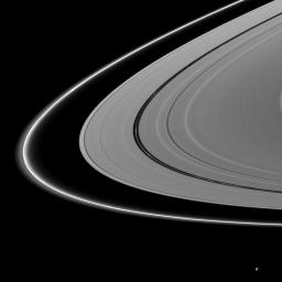 About a month after Saturn's August 2009 equinox, shadows continue to grace the planet's rings in this image taken by NASA's Cassini Orbiter. Pan runs through the center of this image.