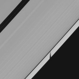 Around the time of equinox, Epimetheus' shadow was cast on Saturn's rings rather than the planet in this image from NASA's Cassini spacecraft taken on Jan. 16, 2009.