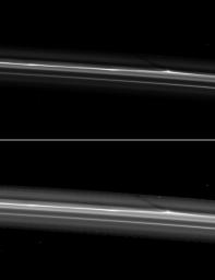 NASA's Cassini spacecraft spies a shadow cast by a vertically extended structure or object in the F ring in this image taken as Saturn approaches its August 2009 equinox.