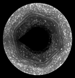This image from NASA's Cassini, made possible only as Saturn's north pole emerged from winter darkness, shows new details of a jet stream that follows a hexagon-shaped path and has long puzzled scientists.