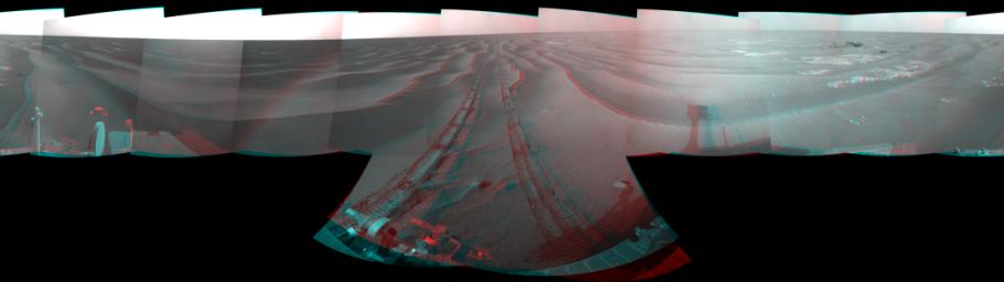 NASA's Mars Exploration Rover Opportunity used its navigation camera to take the images combined into this stereo 180-degree view on March 5, 2009. 3D glasses are necessary to view this image.