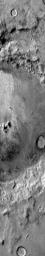 This 2001 Mars Odyssey image shows small individual dunes located on the floor of this unnamed crater in Noachis Terra on Mars.