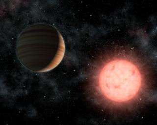 This artist's concept shows the smallest star known to host a planet. The planet, called VB 10b, was discovered using astrometry, a method in which the wobble induced by a planet on its star is measured precisely on the sky.