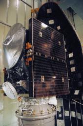 NASA's Dawn spacecraft's solar array wings are folded to fit inside nose section of protective fairing.