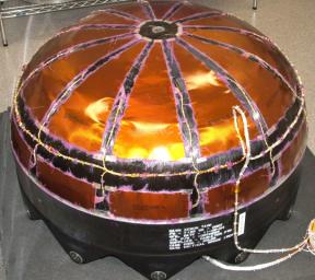 This image shows NASA's Dawn spacecraft's Xenon tank -- composite overwrapped pressure vessel with titanium liner.