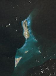 Grand Turk Island is an island in the Turks and Caicos Islands in the Caribbean, and contains the territory's capital, Cockburn Town. NASA's Terra spacecraft acquired this image on September 18, 2001.