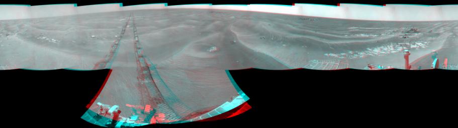 NASA's Mars Exploration Rover Opportunity used its navigation camera to take the images combined into this 360-degree stereo view of the rover's surroundings on July 19, 2009. 3D glasses are necessary to view this image.