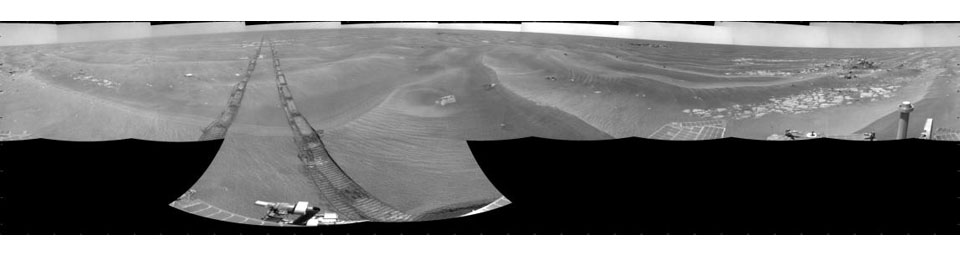 NASA's Mars Exploration Rover Opportunity used its navigation camera to take the images combined into this 360-degree cylindrical view of the rover's surroundings on the 1,950th Martian day, or sol, of its surface mission (July 19, 2009).