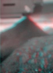 This stereo view combines a pair of images taken by the microscopic imager on NASA's Mars Exploration Rover Spirit during the 1,925th Martian day (sol) of Spirit's mission on Mars (June 2, 2009). 3D glasses are necessary to view this image.