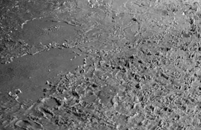 This view of the volcanic plains of Neptune's moon Triton was produced using topographic maps derived from images acquired by NASA's Voyager spacecraft during its August 1989 flyby, 20 years ago this week.