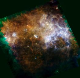 Some of the coldest and darkest dust in space shines brightly in this infrared image from the Herschel Observatory, a European Space Agency mission with important participation from NASA.