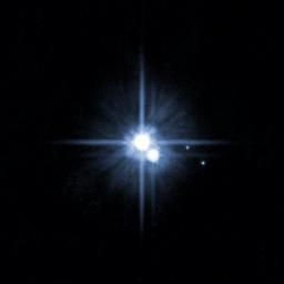A pair of small moons photographed by NASA's Hubble Space Telescope discovered orbiting Pluto in 2005 now have official names: Nix and Hydra.