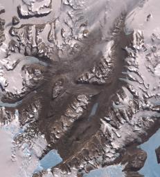 The McMurdo Dry Valleys are a row of valleys west of McMurdo Sound, Antarctica. They are so named because of their extremely low humidity and lack of snow and ice cover. This image was acquired December 8, 2002 by NASA's Terra spacecraft.