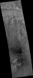 This image from NASA's Mars Reconnaissance Orbiter shows a sample of the variety and complexity of processes that may occur on the walls of Martian craters, well after the impact crater formed.