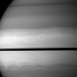 NASA's Cassini spacecraft watches as clouds swirl through Saturn's equatorial latitudes.