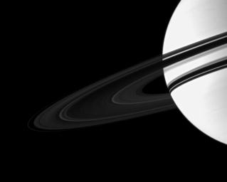 Saturn is overexposed in this image taken by NASA's Cassini spacecraft in order to show the dim rings. Pandora (below rings to the left) has been brightened by a factor of 1.3 relative to the planet and the rings to enhance its visibility.