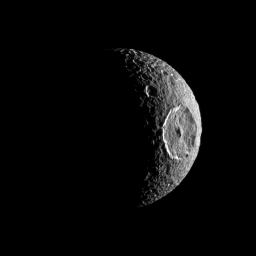 NASA's Cassini spacecraft turns the eye of its camera toward Saturn's moon Mimas and spies the large Herschel Crater which itself looks like the iris of an eye peering out into space.