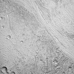 NASA's Cassini spacecraft surveys the surface of Saturn's moon Enceladus in this image, which shows newly created terrain in the upper right meeting older, cratered terrain in the lower left.