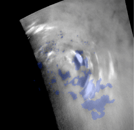 Clouds move above the large methane lakes and seas near the north pole of Saturn's moon Titan in this image taken by NASA's Cassini spacecraft.