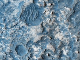 This image from NASA's Mars Reconnaissance Orbiter shows part of an unnamed crater, itself located inside the much larger Newton Crater, in Terra Sirenum. Original release date March 3, 2010.