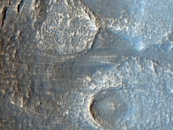 The terrain in this image from NASA's Mars Reconnaissance Orbiter lies in the Deuteronilus Mensae region along the highland-lowland dichotomy boundary in the northern hemisphere of Mars.