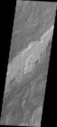 The lava flows in this image taken by NASA's 2001 Mars Odyssey spacecraft are part of the extensive flow field of Arsia Mons.