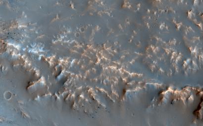 This image of a well-preserved unnamed elliptical crater in Terra Sabaea, captured by NASA's Mars Reconnaissance Orbiter, shows the complexity of ejecta deposits forming as a by-product of the impact process that shapes much of the surface of Mars.