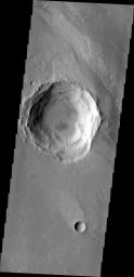 This image from NASA's 2001 Mars Odyssey shows a lava flow that topped the rim of an impact crater and flowed down to the floor of the crater.