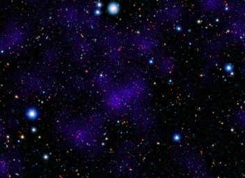 NASA's Spitzer Space Telescope contributed to the infrared component of the observations of a surprisingly large collections of galaxies (red dots in center). Shorter-wavelength infrared and visible data are provided by Japan's Subaru telescope.