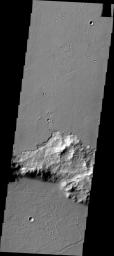 In some regions of Mars the relative ages of different materials can be determined. In this image, captured by NASA's 2001 Mars Odyssey, the younger lava flows of Daedalia Planum are on top of the older Terra Sirenum materials.