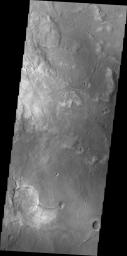 Small unnamed channels drain the surface in this region of Arabia Terra were captured by NASA's Mars Odyssey on August 3, 2010.