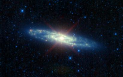 The Sculptor galaxy, or NGC 253, is seen in a rainbow of infrared colors in this mosaic by NASA's Wide-field Infrared Survey Explorer. The Sculptor galaxy can be seen by observers in the southern hemisphere with a pair of good binoculars.