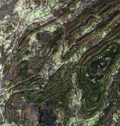 NASA's Terra spacecraft captured this image of the Ouachita Mountains in southeast Oklahoma. The Ouachitas are fold mountains, formed about 300 million years ago when the South American Plate drifted northward, colliding with the North American Plate.