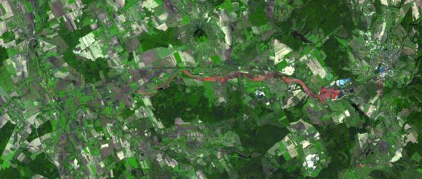 The ASTER instrument onboard Terra's spacecraft imaged the toxic sludge spill in Hungary on Oct. 11, 2010. A million cubic meters (35 million cubic feet) of red sludge spilled from a reservoir at an alumina plant in Ajka in western Hungary.