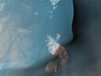 This observation from NASA's Mars Reconnaissance Orbiter shows a Southern hemisphere crater with gullies, dunes, periglacial modification, bright rock deposits, and dust devil tracks.