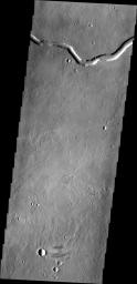 NASA's Mars Odyssey shows Rhabon Valles, a lava channel located between Ascraeus Mons and Uranius Mons.